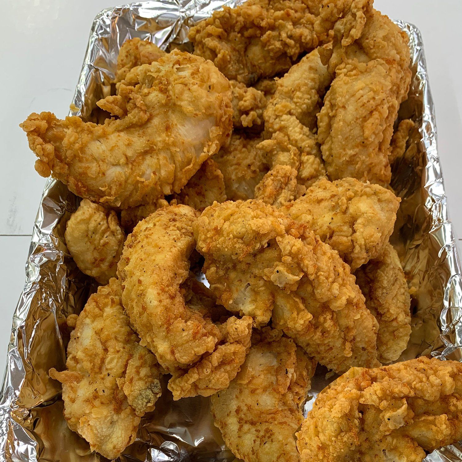 Basket of broasted chicken tenders